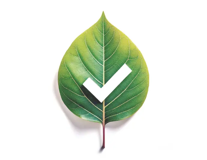 Green leaf with a white checkmark, symbolizing InnuScience’s certifications for sustainability and safety.