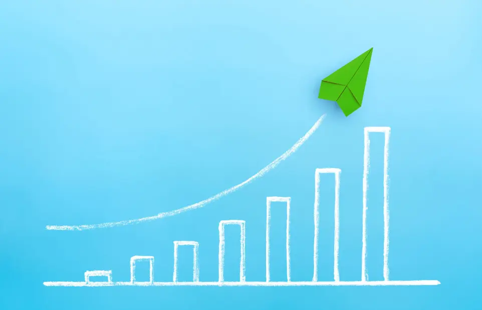 Tap into a Booming Market: Grow with biotech-powered cleaning solutions for eco-conscious consumers. Green paper airplane soaring above a growth chart, symbolizing the booming market for biotech cleaning products and sustainability-driven innovation